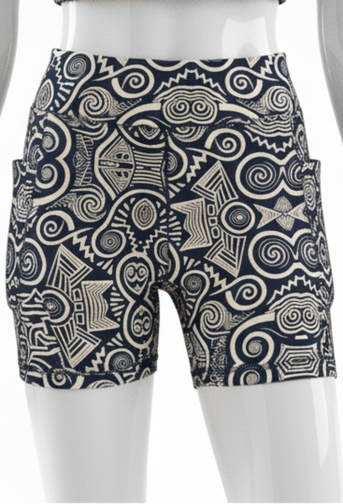 Mannequin wearing a black and beige ankara patterned gym shorts set on a white background