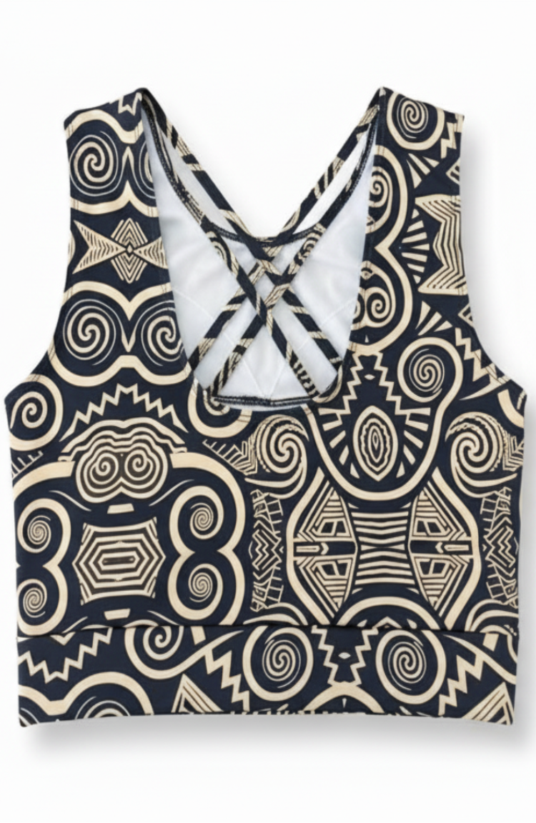 Black and beige patterned top on a white background