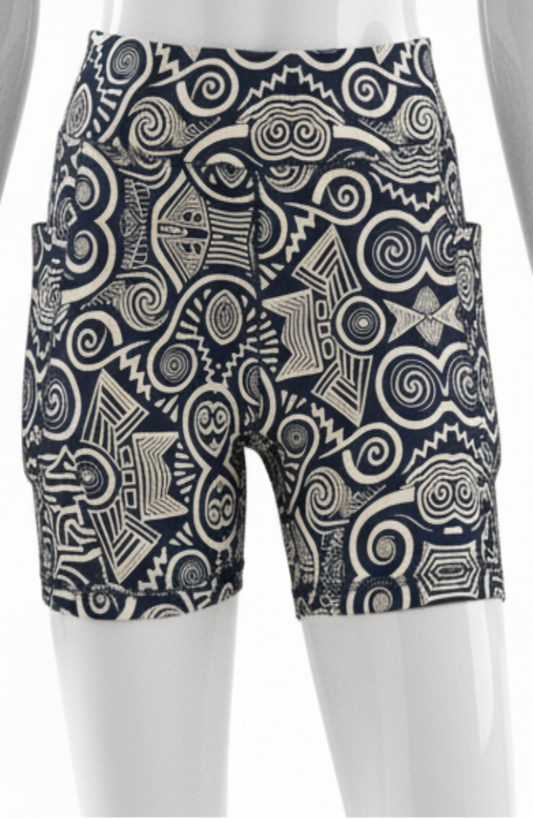 Black and beige geometric patterned ankara  yoga shorts with on a white background